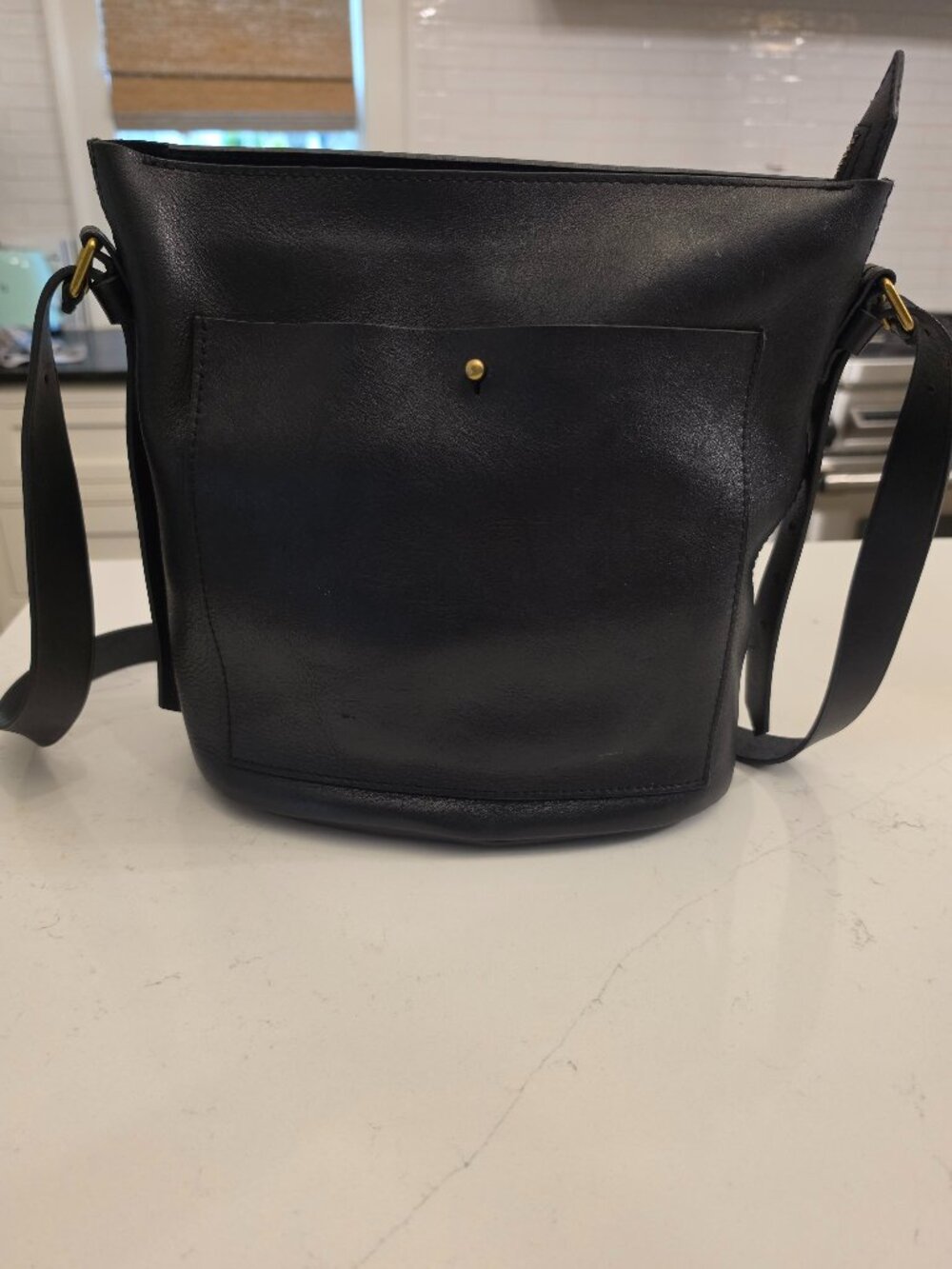 Madewell black leather cross body bucket bag